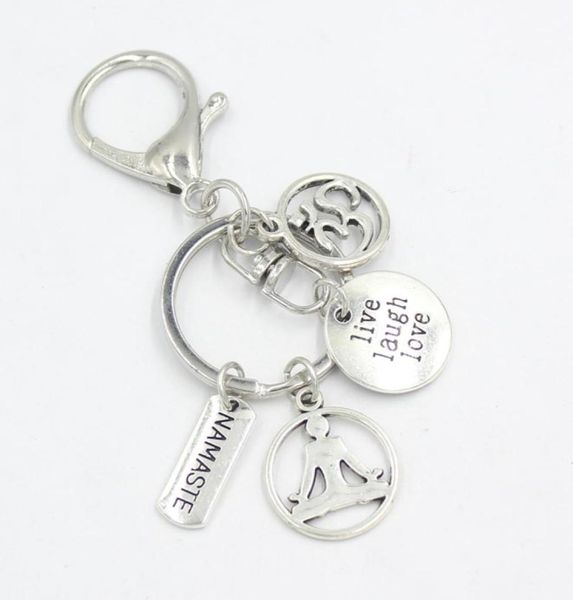 

whole om yoga keychain women handbag charms key chain key ring holder bag pendant accessory jewelry yogagirl gifts9725436, Slivery;golden