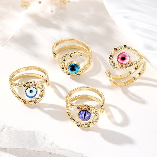 

copper plated gold metal rings for women hq trendy charming cat's eye evil eye cabs cutting hollow rings, Golden;silver