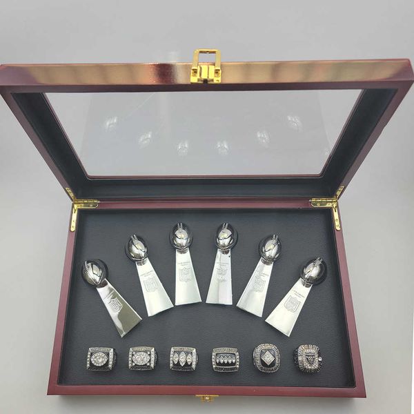 

6 super bowl trophies and 6 los angeles rangers champion ring set, Silver