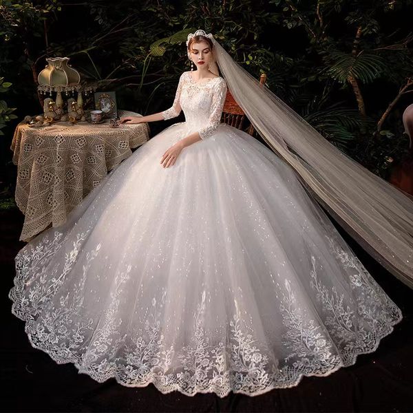 

2023 african lace wedding dresses sheer neck illusion long sleeve puffy buttons vestidos de noiva crystal beaded diamond luxury formal new e, White