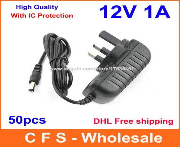 

50pcs ac adapter dc 12v 1a power supply with ic version uk eu au us plug adaptor dhl 6472599