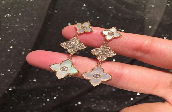 

long dangling chandelier pretty shell diamond zirconia flower earrings new fashion stud earrings for woman girls students2332363, Golden;silver