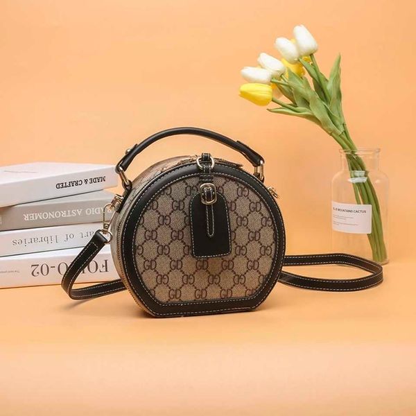 

handbag designer 2023 netizen women's new versatile crossbody single shoulder retro texture small round bag