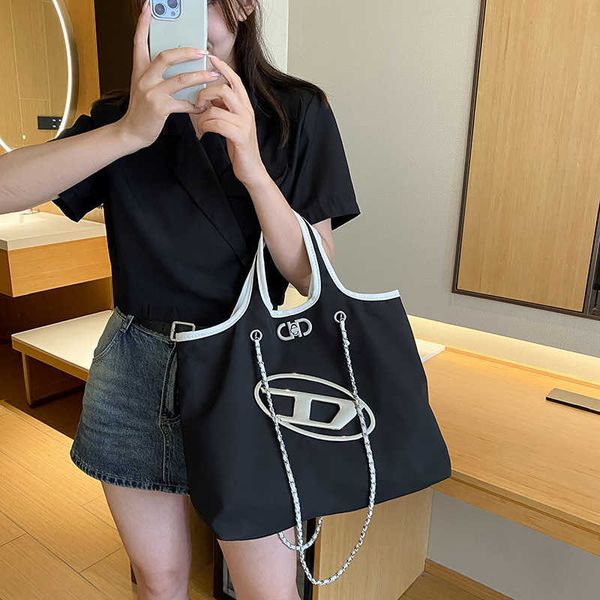 

handbag designer 2023 xiaoxiangfeng summer new trendy high end contrast color large capacity shopping women's bag