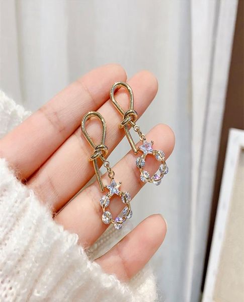 

high sense female audience cool style retro earrings east gate silver needle knotting earrings korean earrings whole4282029, Golden