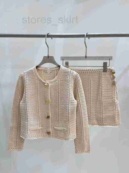 

two piece dress designer 23 autumn new product hollow out knitted set slim fit style cardigan short skirt for women v0fd, White