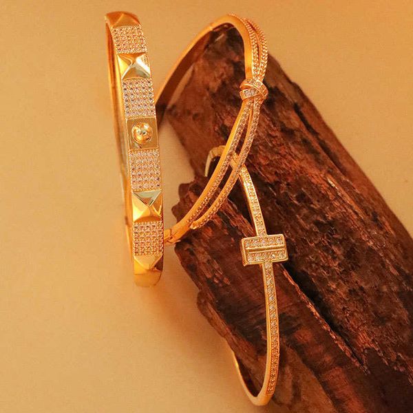 

copper plated genuine gold micro set zircon solid bracelet fashion design light luxury women's new hand jewelry, Golden;silver