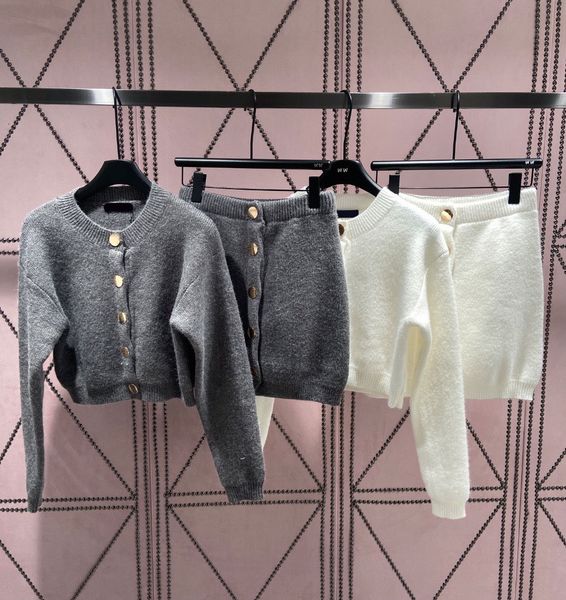 

new fashion 2023 autumn winter single-breasted o-neck long sleeve knitted and high waist gold button mini skirt 2 pieces set, White