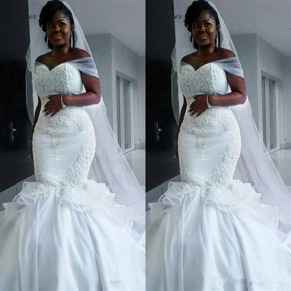 

2020 new south african plus size mermaid wedding dresses off shoulder lace appliques beaded arabic sweep train formal bridal258n, White