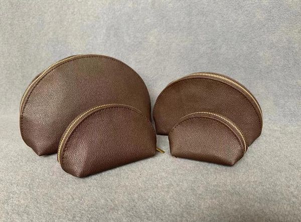 

fashion women cosmetic bags famous makeup bag travel pouch make up bags ladies cluch purses organizador toiletry handbag 4pcs set