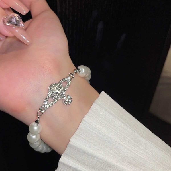 

empress dowager pearl feminine style versatile and simple handstring bracelet light luxury high grade feeling friend handicraft, Golden;silver