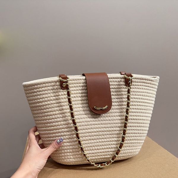 

straw woven women designer beach bucket bag gold metal hardware matelasse chain turn lock medium shoulder handbag drawstring pocket holiday