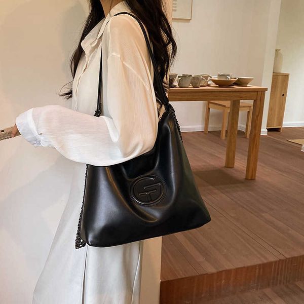 

south 2023 new niche soft leather tote bag with large capacity and advanced texture for commuting double shoulder one sling dual purpose wom