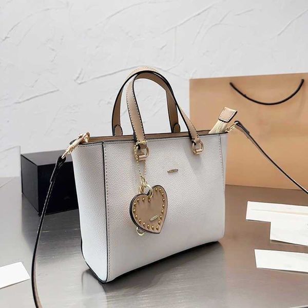 

sell coabag large capacity tote bag totes leather designers handbags women duffle bags fashion designer bag with heart work purse luxury sho