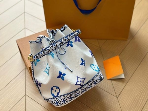 

new versatile bag crossbody bag water bucket bag summer light leather handheld makeup bag