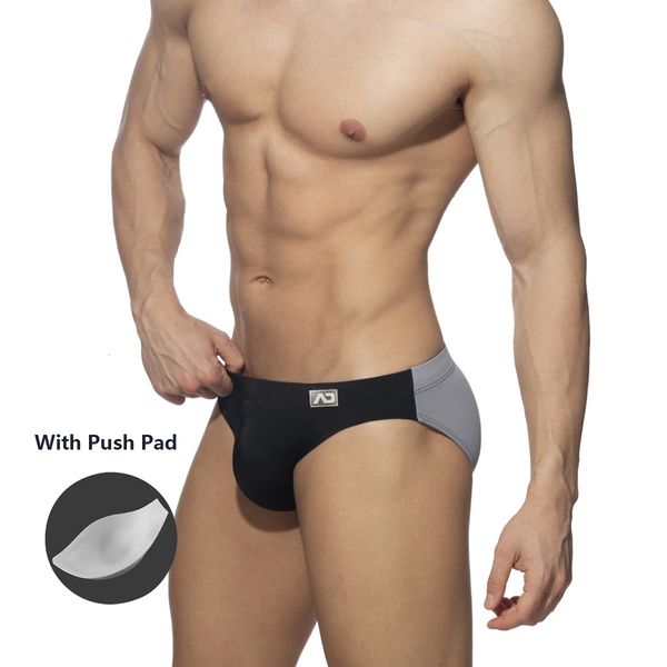 

men's swimwear solid color stitching with push pad triangle swim trunks fashion low waist bikini summer beach surf quick dry 230724