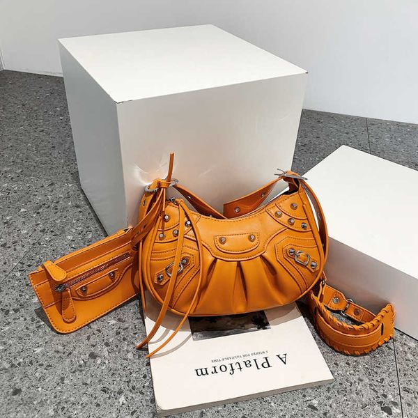 

new women's trendy and fashionable rivet locomotive bag with small design crescent one sling shoulder crossbody purses