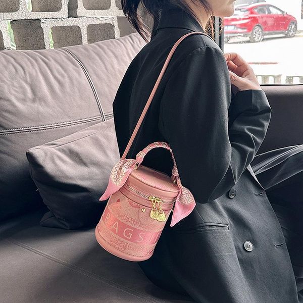

Factory wholesale shoulder bag this year's popular letter printed handbag sweet stereotypes cylinder handbags small fresh ribbon mobile phone coin purse 3518#, Welfare color/regular packaging