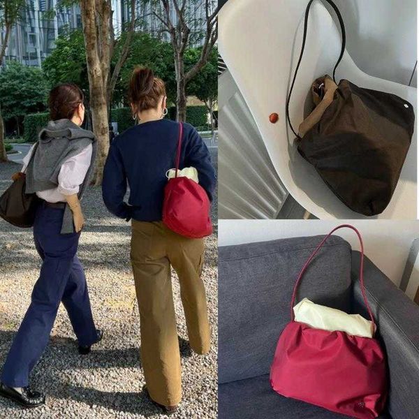 

designer bags leather commuter tote advanced sense one shoulder bucket classic tote the row pjox