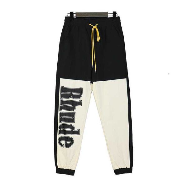 

designer clothing casual pant rhude nylon pants hip-hop trendy flu color contrast stitching sports casual loose leggings men streetwear jogg, Black