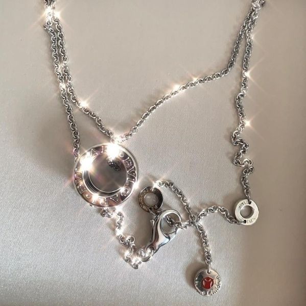 

luxurious and fashionable designer necklace in black ceramic with 925 sterling silver for men and women.