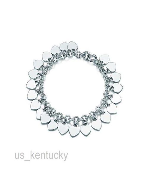 

charm bracelets famous 925 sterling silver designer brands classic charm diy bracelet multi heart label handwear l2212164664895, Golden;silver