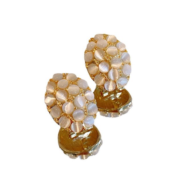 

earings designer fashion trendy french vintage premium gold cat's eye stone oval silver needle female minority personality design tempe