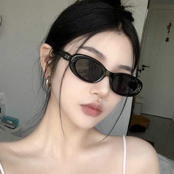

oval sunglasses rice nails women's senior sense street sconcave thin uv resistant sunglasses, White;black