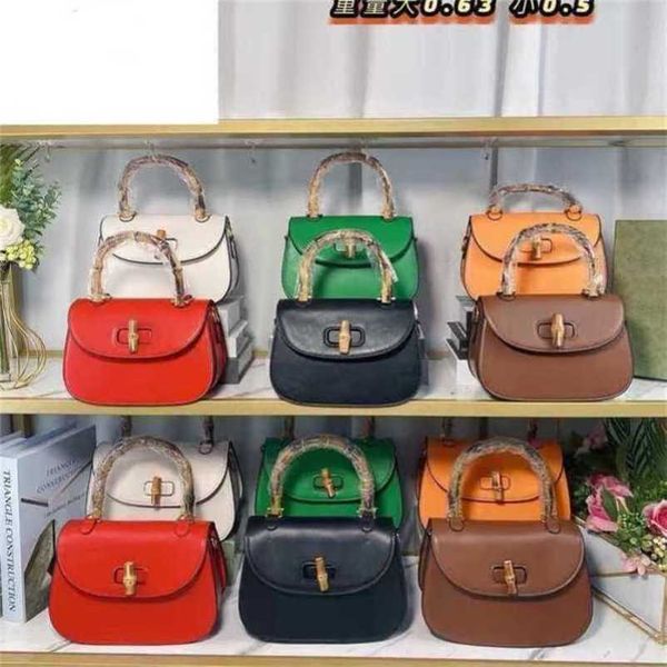 

2023 new luxury bags bamboo solid color shoulder messenger hand saddle