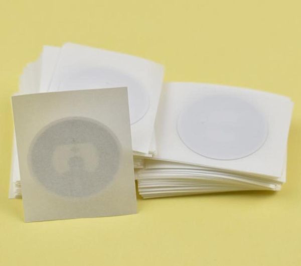 

in stock 100pcslot 25mm round epaper rfid label sticker tag1356mhz iso1443a ntag215 nfc sticker for all nfc enabled phones3987471