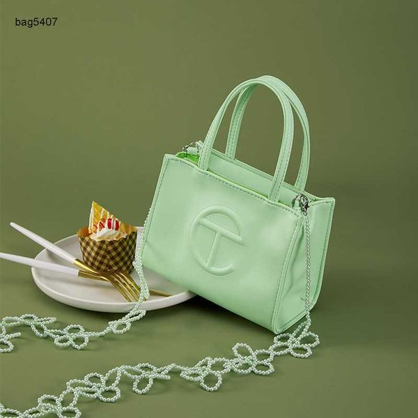 

fashion bags 80% factory direct sales or retailte new onnuk same t-bag one shoulder crossbody drag special bag simple handbag