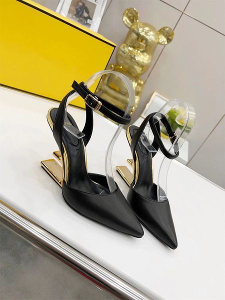 

summer first black leather high-heeled sandals with wide band and strap made of leather diagonal fshaped sculpted heel in gold-coloured meta