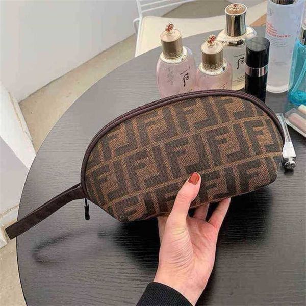 

2023 luxury bags travel toiletries business trip portable storage large capacity hand holding wallet simple make-up mobile phone