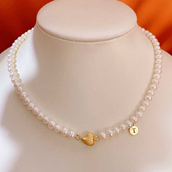 

designer tiffay's same kind of love magnet clasp neck chain is playful and lively 5-6mm freshwater pearl necklace with small tag embell, Silver