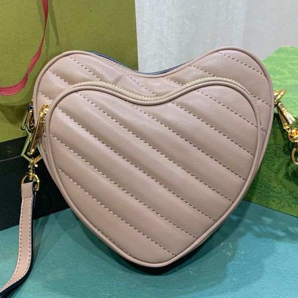 

heart shaped shoulder bag cowhide purse removable shoulder strap metal letter hardware cowhide genuine leather zipper open designer handbag