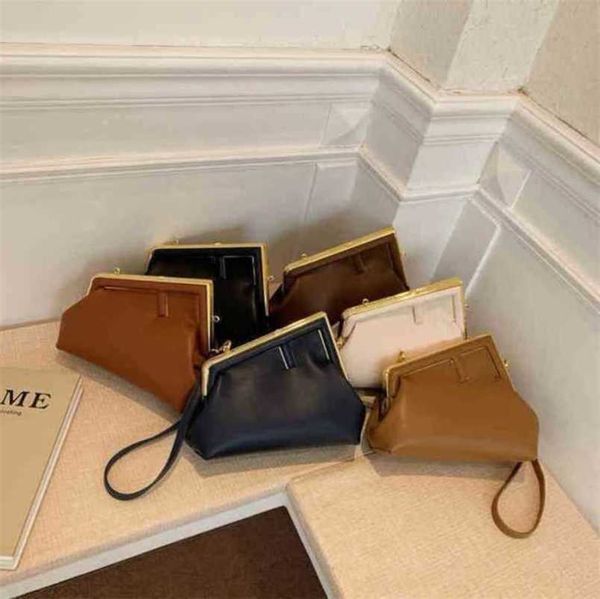 

2023 new luxury bags minority style texture shoulder messenger personalized shell 15kw