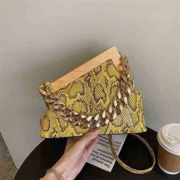 

2023 new luxury bags niche acrylic portable triangle wood clip snake