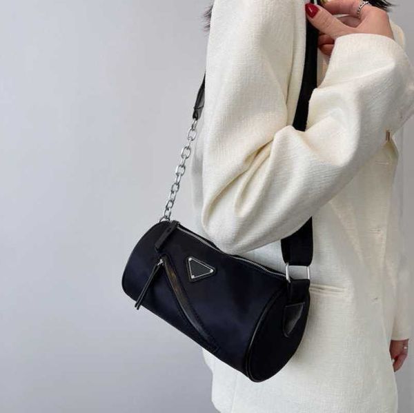 

2023 factory direct sales hip hop nylon fabric for women new fashion chain broadband crossbody small street ins one shoulder cylinder bag