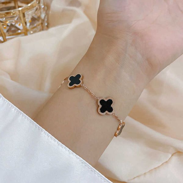 

colorless titanium steel four leaf grass female ins cool wind net red simple small and luxury friend bracelet jewelry, Black