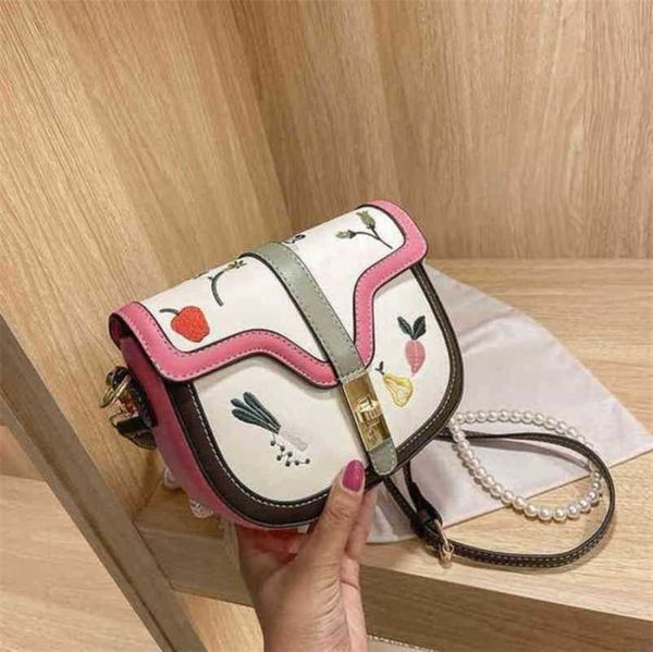 

designer luxury bags printed saddle pearl chain messenger