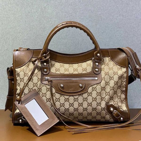 

factory direct sales 2023 spring new tote korean version texture rivet handbag us large capacity shoulder bag