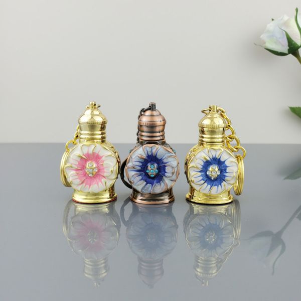

fashion flower 3ml perfume bottles dubai style pendant empty perfume bottle with keychains wholesale glass bottle of essential oil nail poli