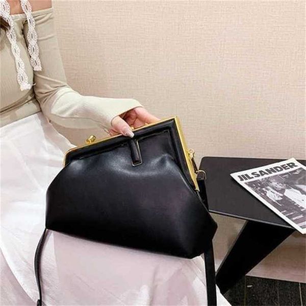 

2023 new luxury bags niche solid color hand cloud texture messenger