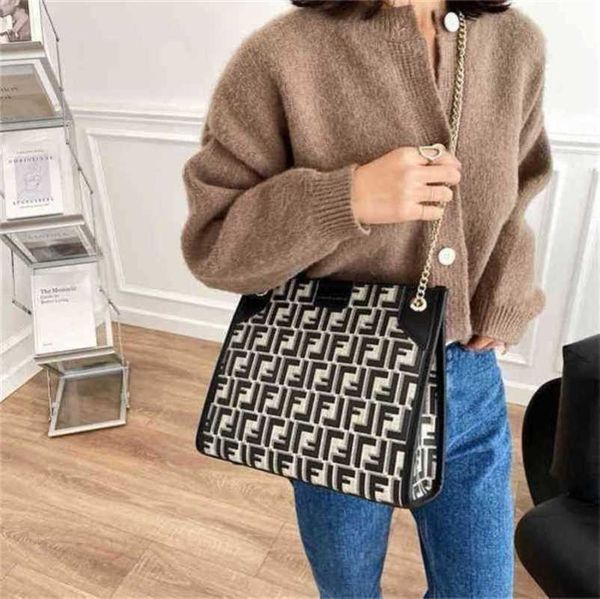 

capacity letter shoulder red chain messenger