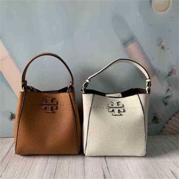 

niuhuo simple leisure skin pure color bucket cross carrying women