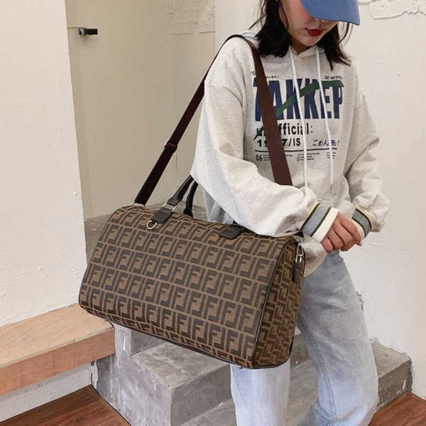 

new luxury 2023 factory direct sales letter leisure portable large capacity travel luggage storage bag