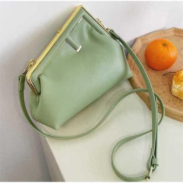 

2023 new luxury bags spring clip irregular sense messenger niche shoulder