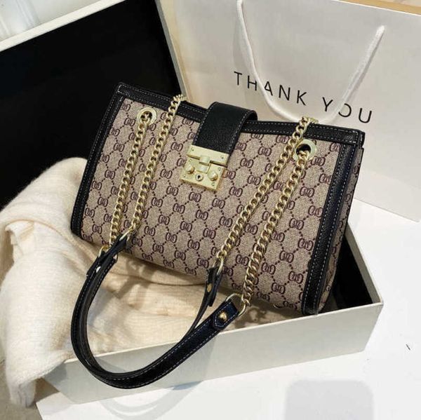 

luxury factory direct sales high capacity printed tote 2023 new fashion casual chain single shoulder underarm bag