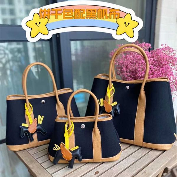 

classic garden party tote bag autumn and winter fashion cowhide women's canvas with leather portable one shoulder oblique span bun moth