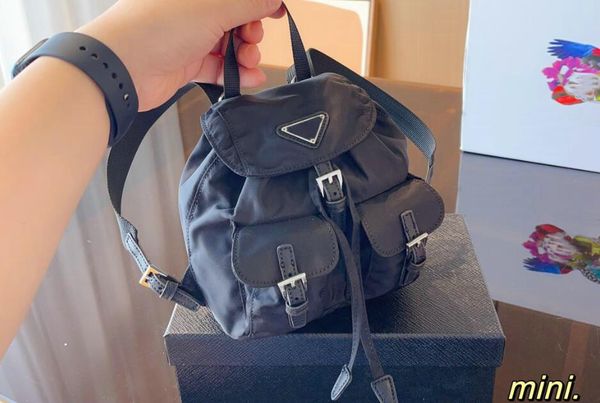 

designers backpack womens recycled nylon letters women mini shoulder messenger bag luxury backpacks travel bags schoolbag